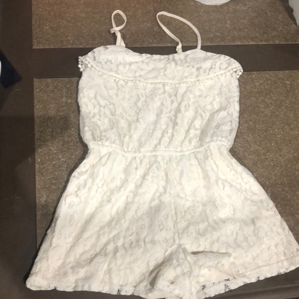 White romper with ruffles